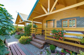 Gemütliches Holzferienhaus mit Grill und Garten